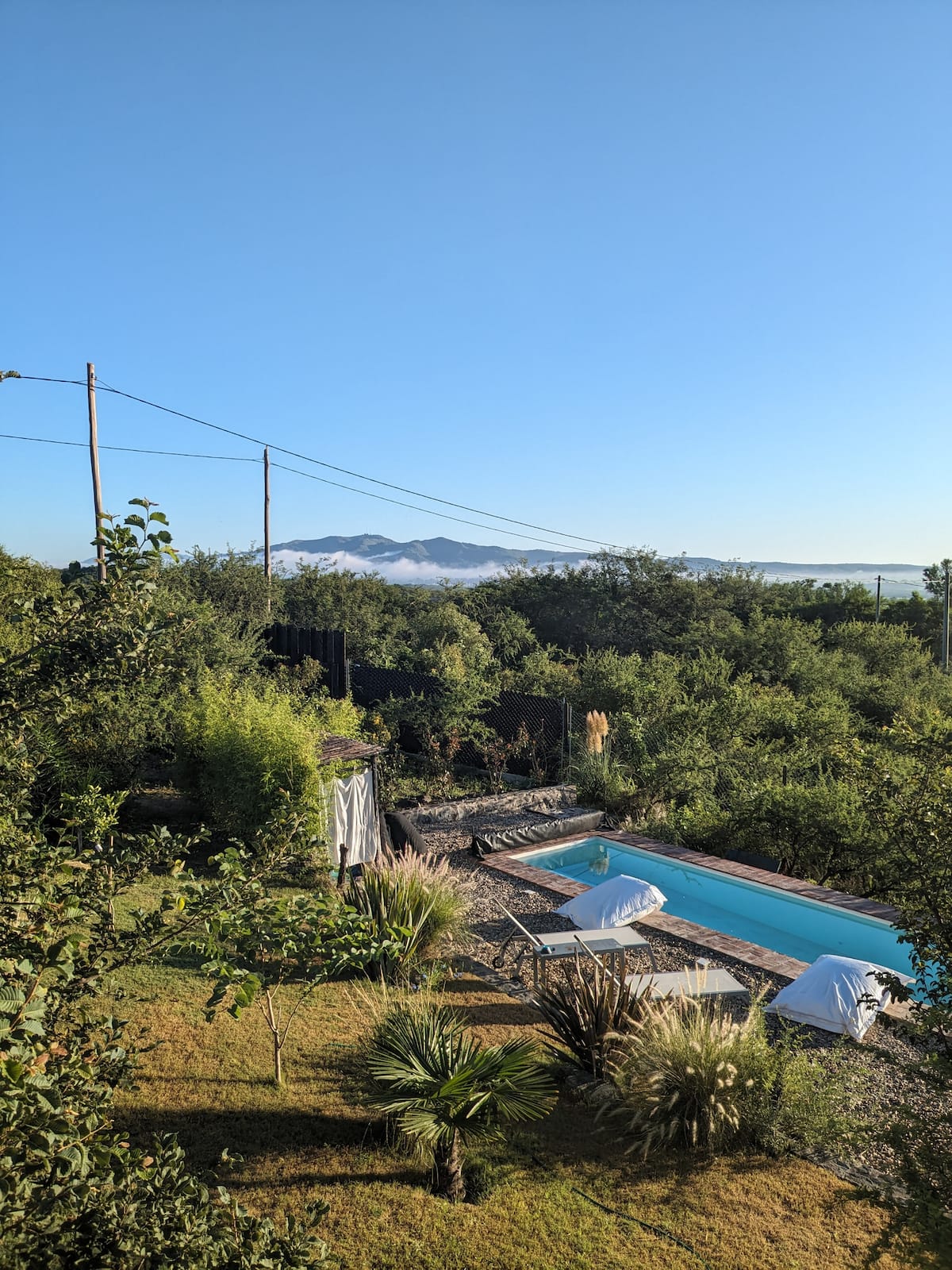 Aerial view of house and pool