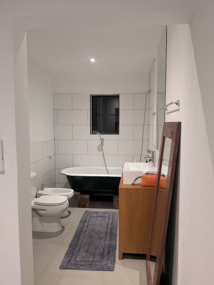 Bathroom with antique clawfoot bathtub